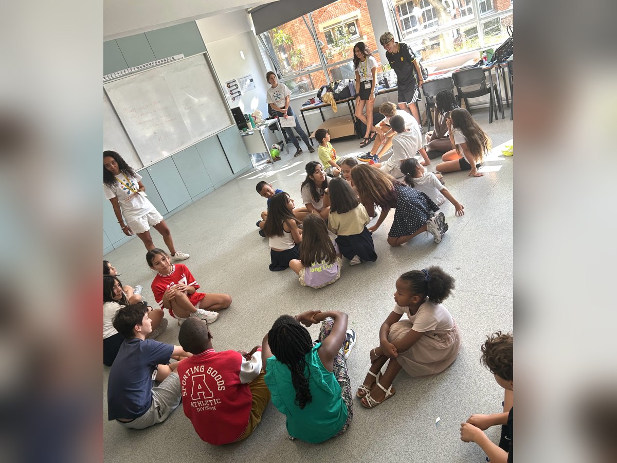Jazzitup Kids children working together in a storytelling circle